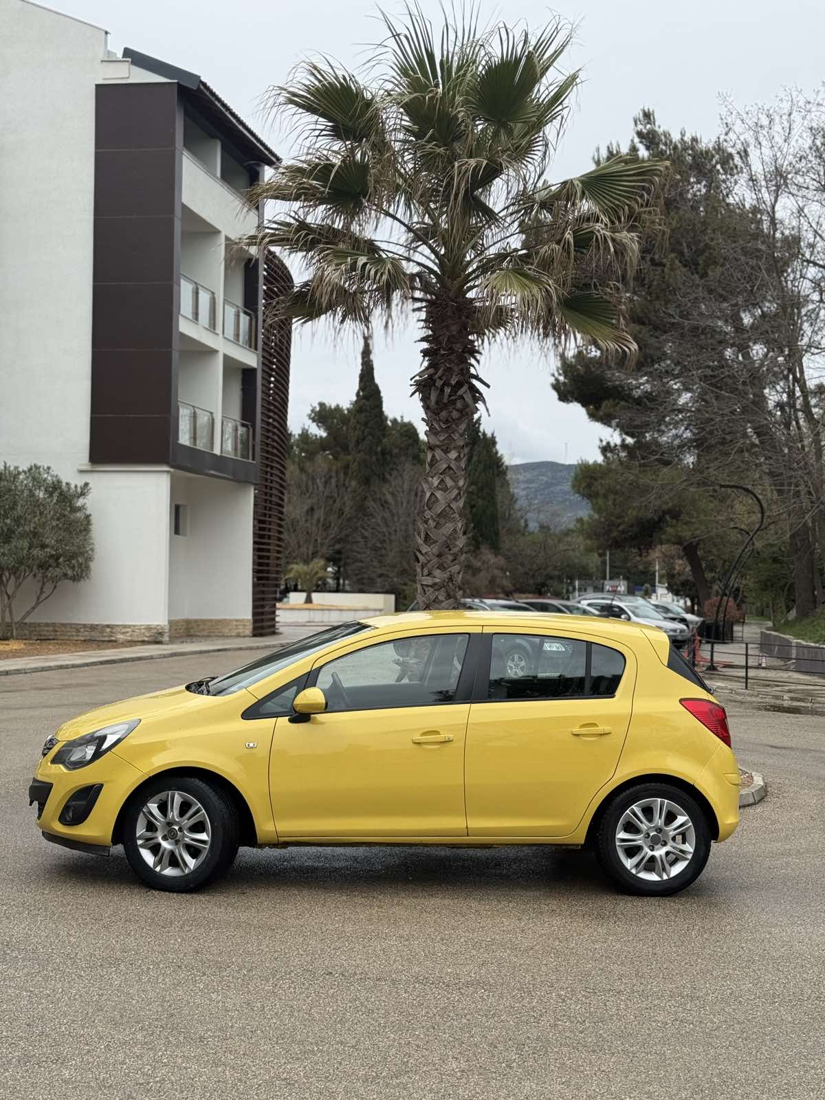Car parked in front of a modern building during a sunny day in Ulcinj