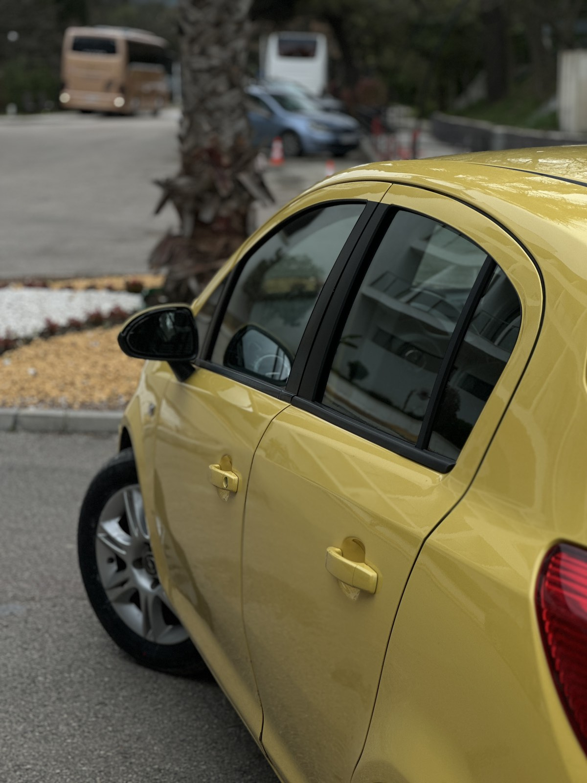 Car parked in front of a modern building during a sunny day in Ulcinj
