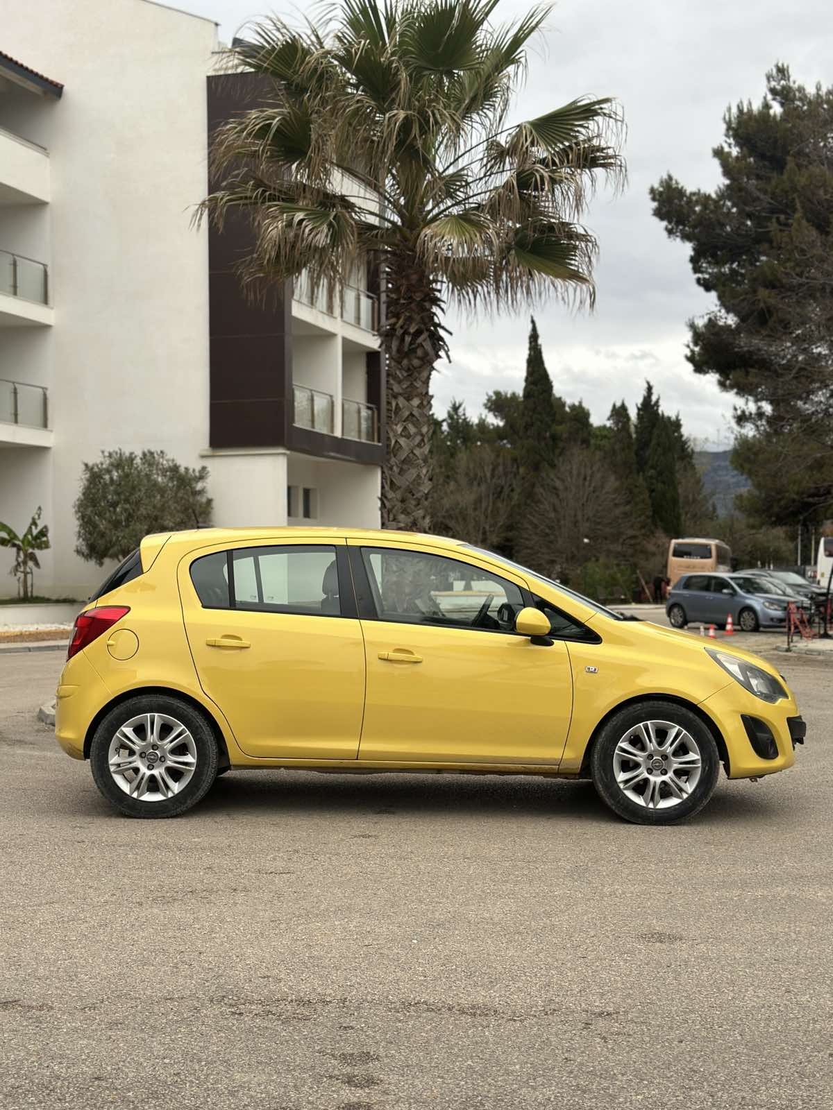 Car parked in front of a modern building during a sunny day in Ulcinj