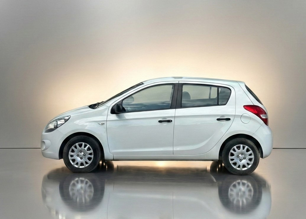 Car parked in front of a modern building during a sunny day in Ulcinj